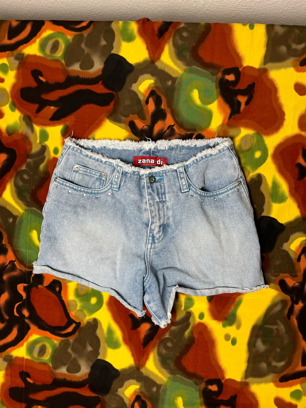 Y2K zana di style blue denim shorts with studs and frayed hem